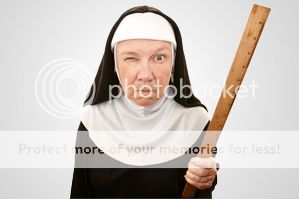 funny-nun-carrying-wooden-ruler-as-a-weapon-ss-46159378.jpg